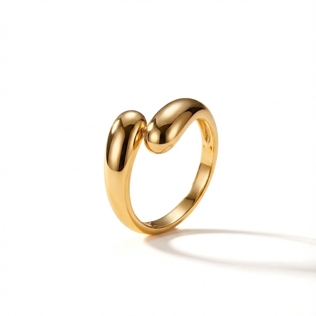 14Kt solid yellow gold bypass ring with polished dome ends, quiet luxury jewelry for women.