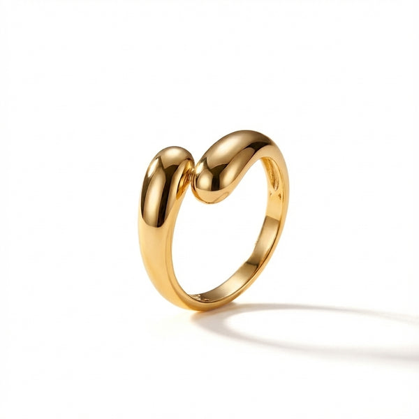 14Kt solid yellow gold bypass ring with polished dome ends, quiet luxury jewelry for women.
