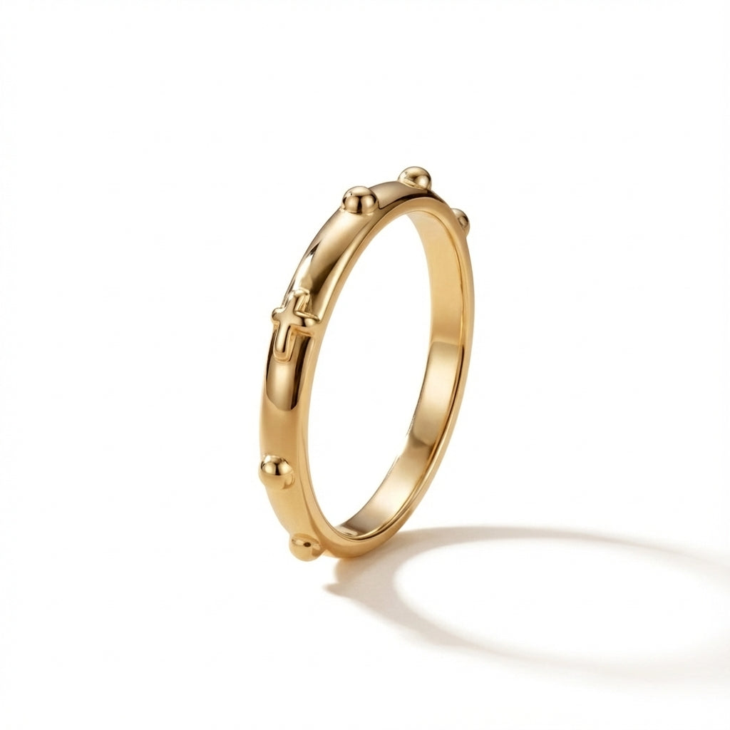 14Kt yellow gold rosary ring with small polished beads and a delicate cross detail, ideal for daily wear.