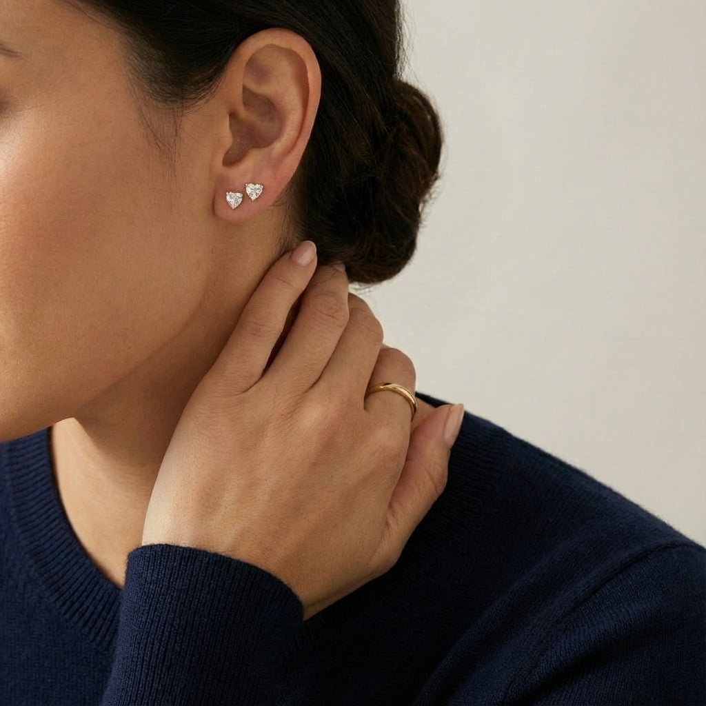 14Kt gold heart stud earrings with zirconia photography by Morelove Designs