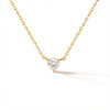 Dainty 14Kt gold chain necklace with a sparkling round zirconia solitaire pendant.