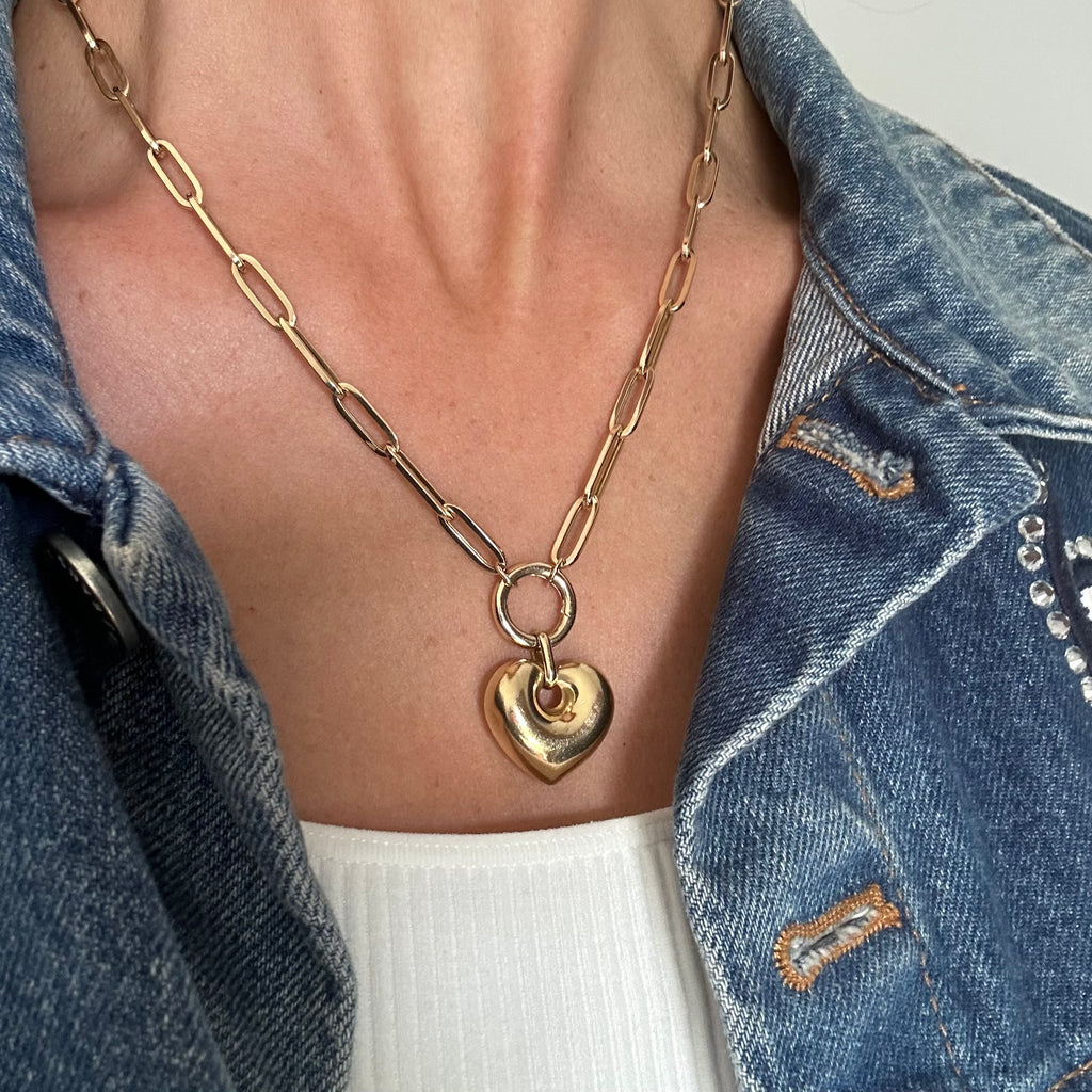 Fashionable adult's 14Kt solid gold paperclip necklace, designed for layering or standalone statement, hypoallergenic fine jewelry.