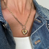 Fashionable adult's 14Kt solid gold paperclip necklace, designed for layering or standalone statement, hypoallergenic fine jewelry.