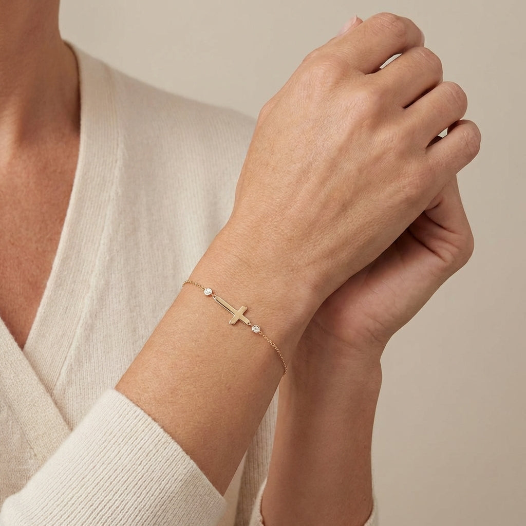 Single Cross Shaped Bracelet with Side Bezel Diamonds in 14Kt Gold