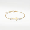 Single Cross Shaped Bracelet with Side Bezel Diamonds in 14Kt Gold