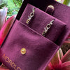 Stylish golden plated silver earrings, sentiment-rich design, contemporary fashion accessory
