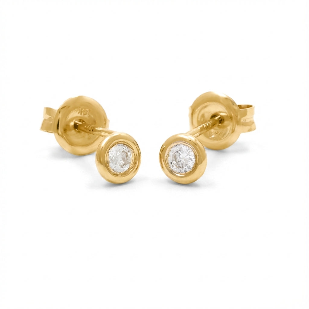 April birthstone diamond earrings, 14K gold bezel set studs, fine jewelry for adults. product photo by Morelove Designs
