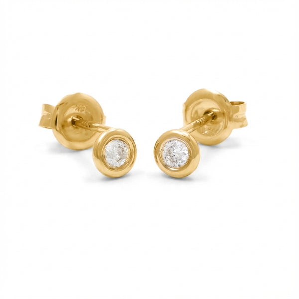 April birthstone diamond earrings, 14K gold bezel set studs, fine jewelry for adults. product photo by Morelove Designs