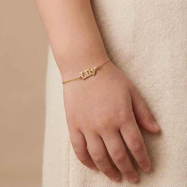 Gold block name bracelet for kids photography by Morelove Designs