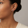 Blue sapphire flower stud earrings 14Kt gold with diamond center photography by Morelove Designs