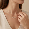 14Kt gold script name necklace with side diamonds photography by Morelove Designs