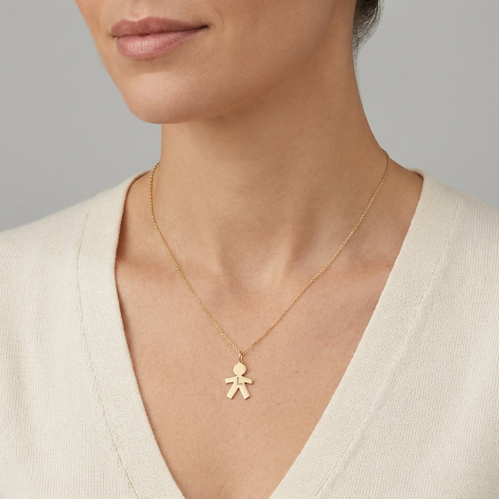 Gold 14Kt boy charm with L initial, personalized jewelry pendant. photography by Morelove Designs