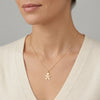 Gold 14Kt boy charm with L initial, personalized jewelry pendant. photography by Morelove Designs