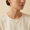 Elegant golden plated silver dangle necklace featuring sparkling square-cut stones, ideal for women's everyday fine jewelry.