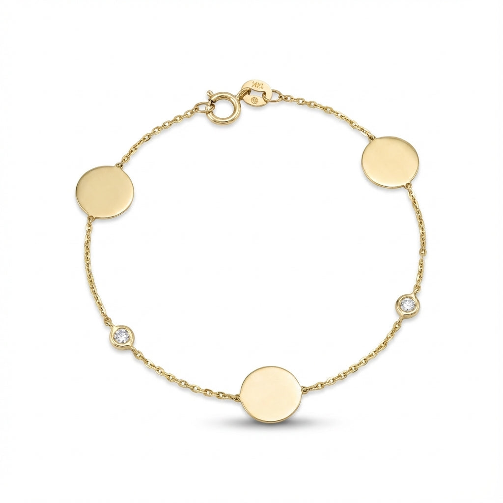 14Kt gold bracelet with three heart charms and two bezel-set diamonds, dainty luxury jewelry for women. product photo by Morelove Designs