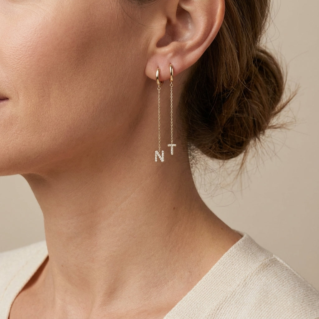 14kt gold earring enhancer with mini pave diamond initial charm, personalized fine jewelry photography by Morelove Designs