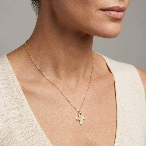 Flat wide cross 14Kt gold charm photography by Morelove Designs