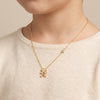 14Kt gold girl charm necklace with side diamond, personalized kids jewelry photography by Morelove Designs