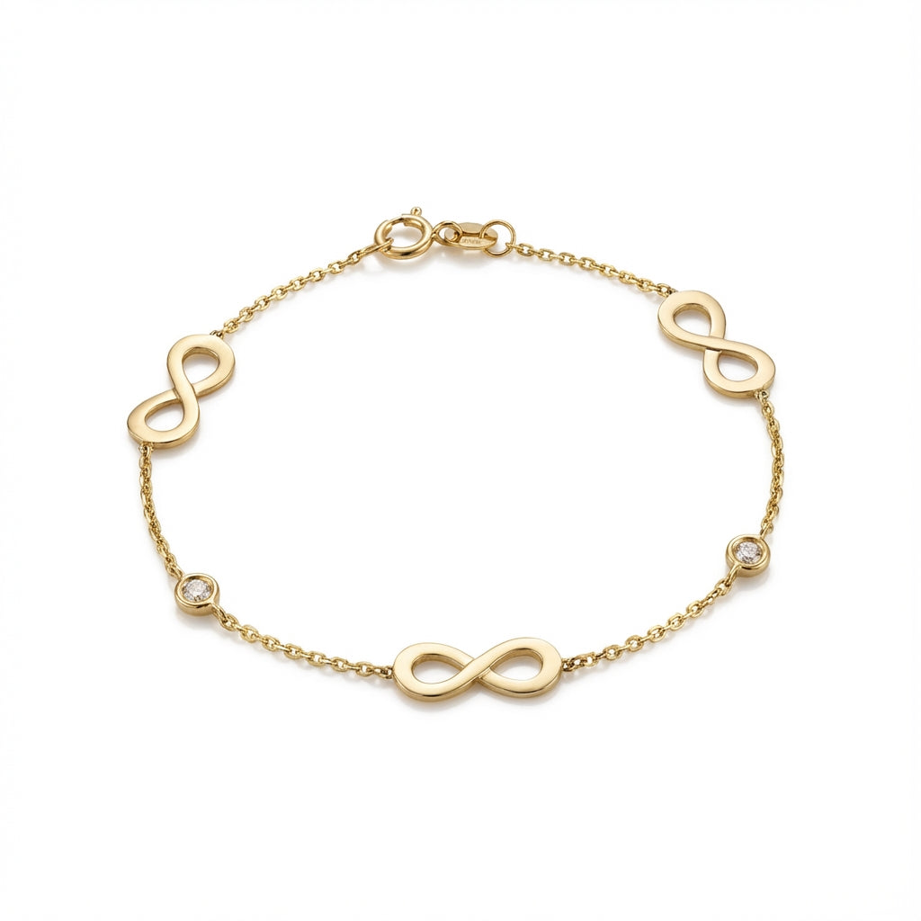 14Kt gold bracelet with three heart charms and two bezel-set diamonds, dainty luxury jewelry for women. product photo by Morelove Designs