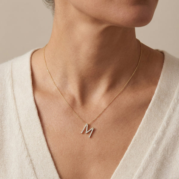 14kt gold initial necklace with micro pave diamonds, personalized fine jewelry for women photography by Morelove Designs