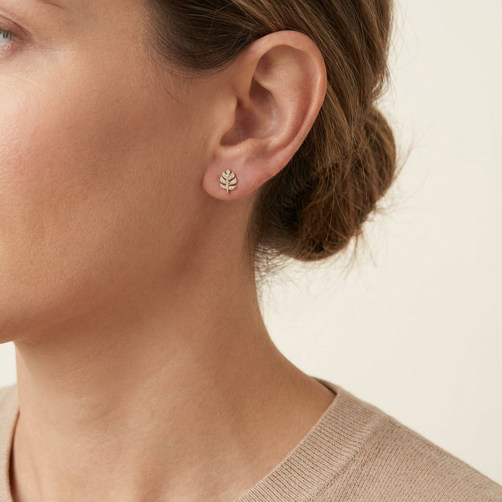 14Kt gold micro pave diamond leaf stud earrings photography by Morelove Designs