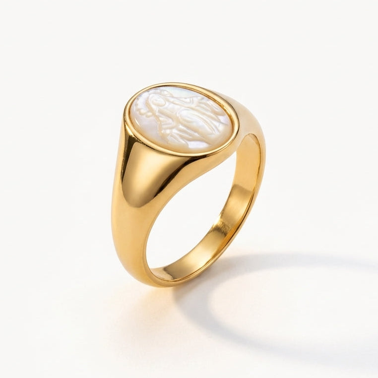 Golden plated silver signet ring with oval Virgin Mary carving.
