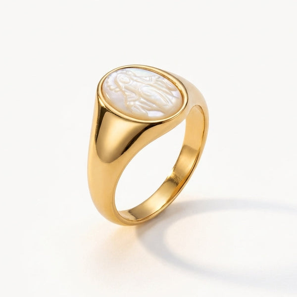Golden plated silver signet ring with oval Virgin Mary carving.