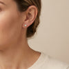 14Kt gold star stud earrings with mother of pearl inlay for adults. Luxury fine jewelry for sensitive skin. photography by Morelove Designs