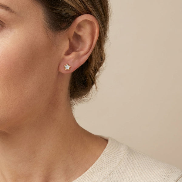 14Kt gold star stud earrings with mother of pearl inlay for adults. Luxury fine jewelry for sensitive skin. photography by Morelove Designs