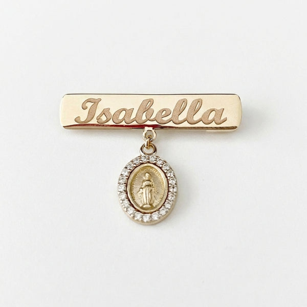 14Kt gold personalized name bar safety pin, "Isabella" engraved, with mini Miraculous Medal charm for kids. product photo by Morelove Designs