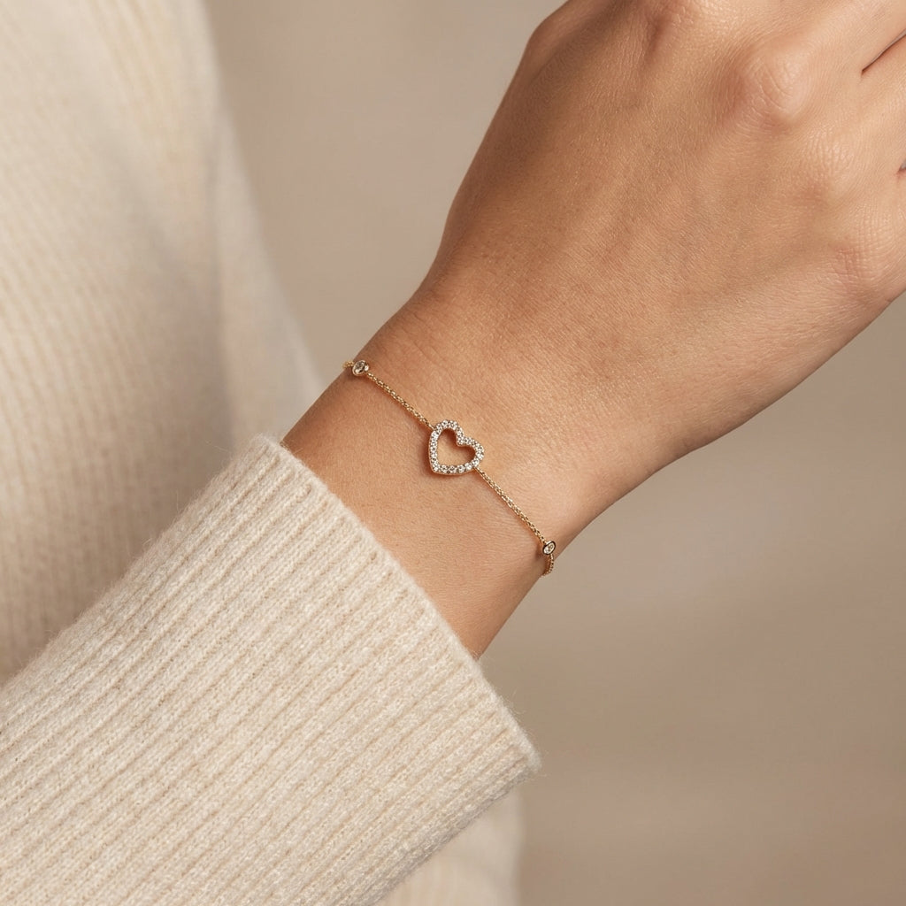 14kt gold open pave heart bracelet with diamond bezels, delicate chain photography by Morelove Designs