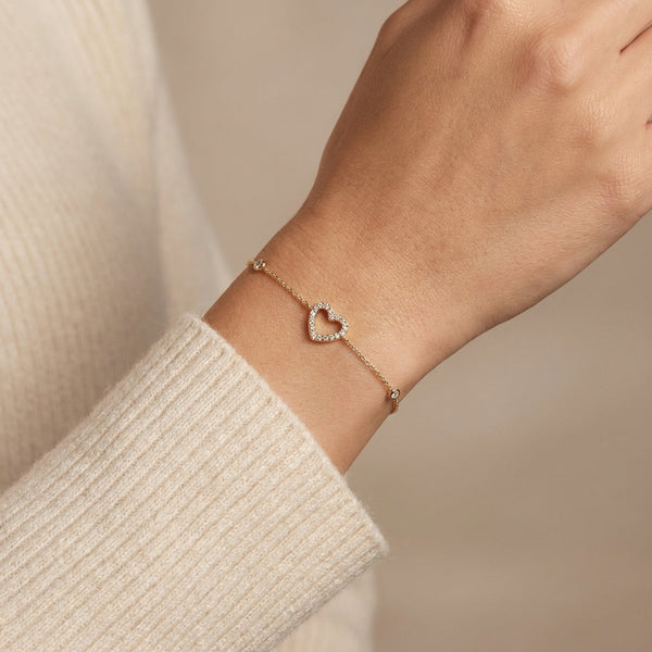 14kt gold open pave heart bracelet with diamond bezels, delicate chain photography by Morelove Designs