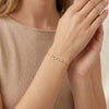 14Kt gold infinity bracelet with pave diamonds; delicate wrist jewelry for adults. photography by Morelove Designs