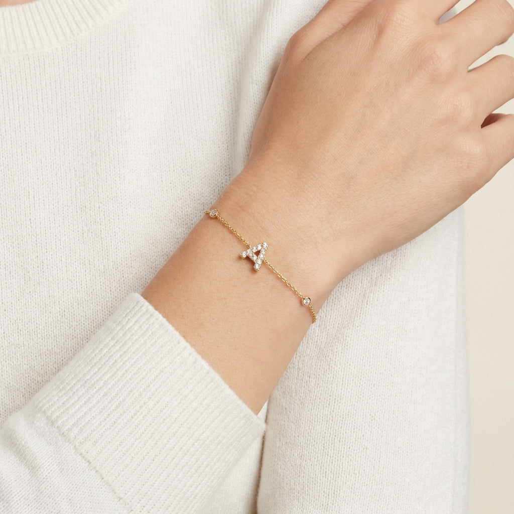 14Kt gold initial A bracelet with pave diamonds and side diamond bezels, elegant fine jewelry for women photography by Morelove Designs