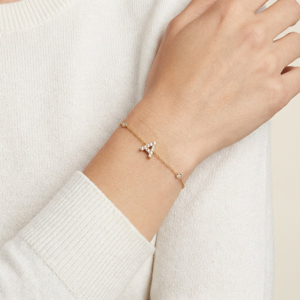 14Kt gold initial A bracelet with pave diamonds and side diamond bezels, elegant fine jewelry for women photography by Morelove Designs