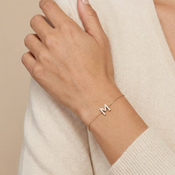 Gold 14Kt pave initial M bracelet, delicate fine jewelry for women, everyday luxury photography by Morelove Designs