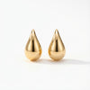 14Kt gold puff drop earrings, minimalist jewelry style, shiny teardrop shape