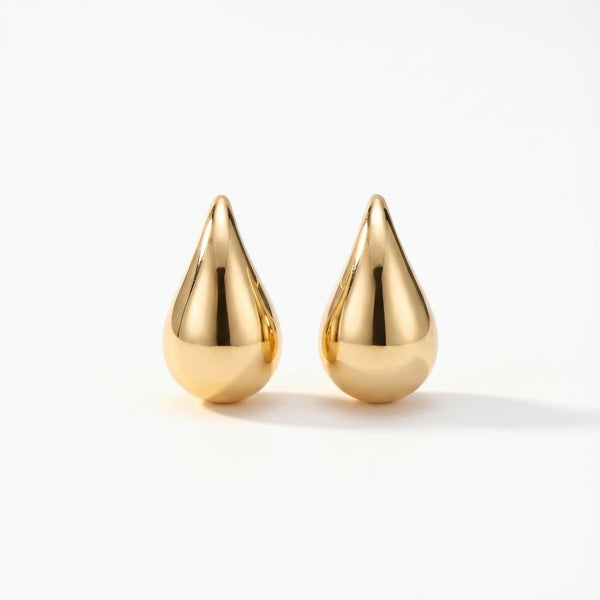 14Kt gold puff drop earrings, minimalist jewelry style, shiny teardrop shape