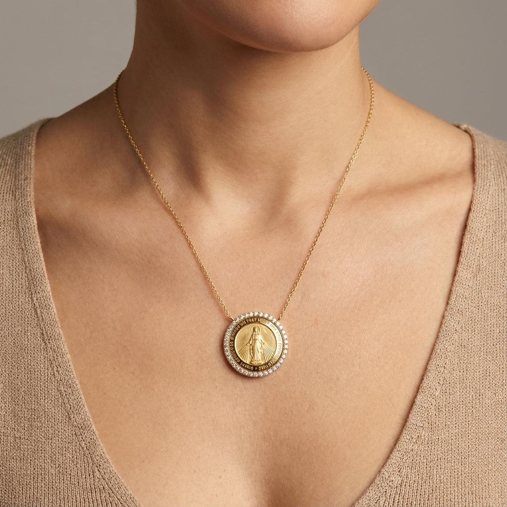 Luxury everyday fine jewelry: round diamond and 14K gold Miraculous Medal pendant.