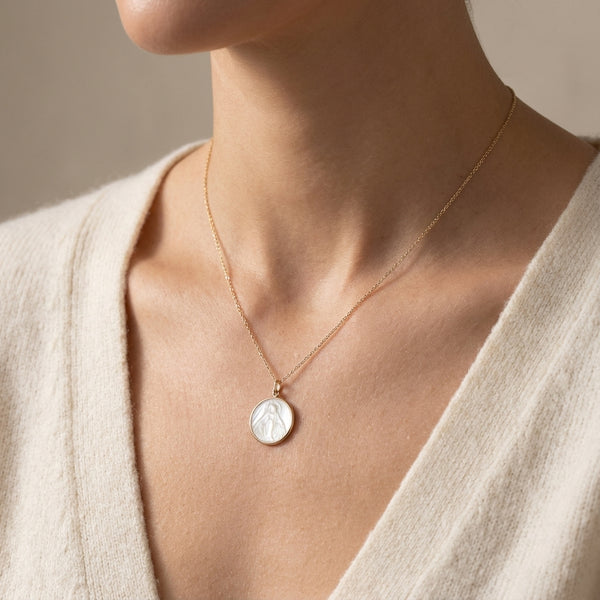 14kt gold mother of pearl religious medal charm photography by Morelove Designs