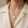 Mother of Pearl Religious Medal with Pink Sapphires in Gold photography by Morelove Designs