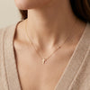 14k gold cross necklace with side bezel diamond, religious jewelry for women, luxury fine gold necklace gift photography by Morelove Designs