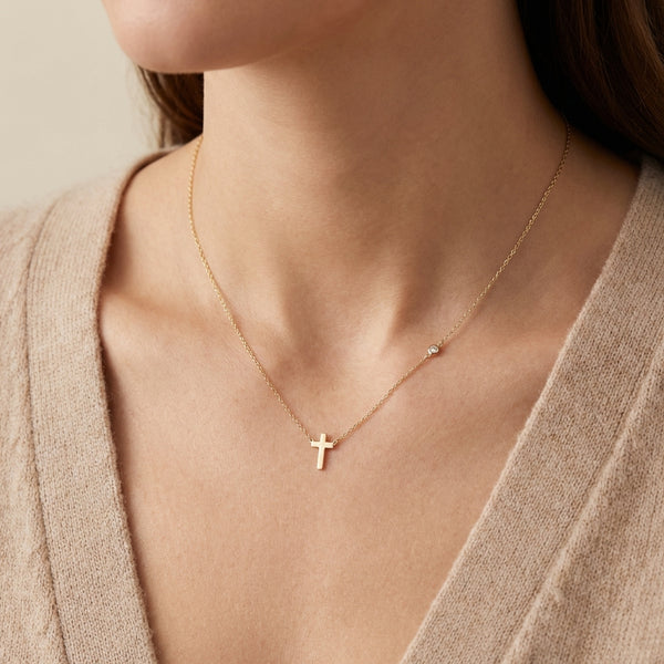 14k gold cross necklace with side bezel diamond, religious jewelry for women, luxury fine gold necklace gift photography by Morelove Designs