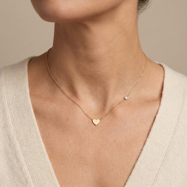 14kt gold heart necklace with diamond accent, minimalist fine jewelry for adults. photography by Morelove Designs