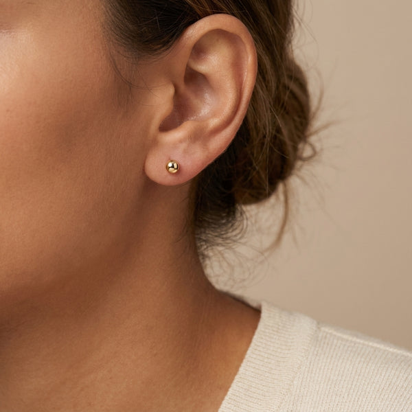 Solid 14kt gold 6mm ball stud earrings with screw-backs, perfect for adults and sensitive skin photography by Morelove Designs