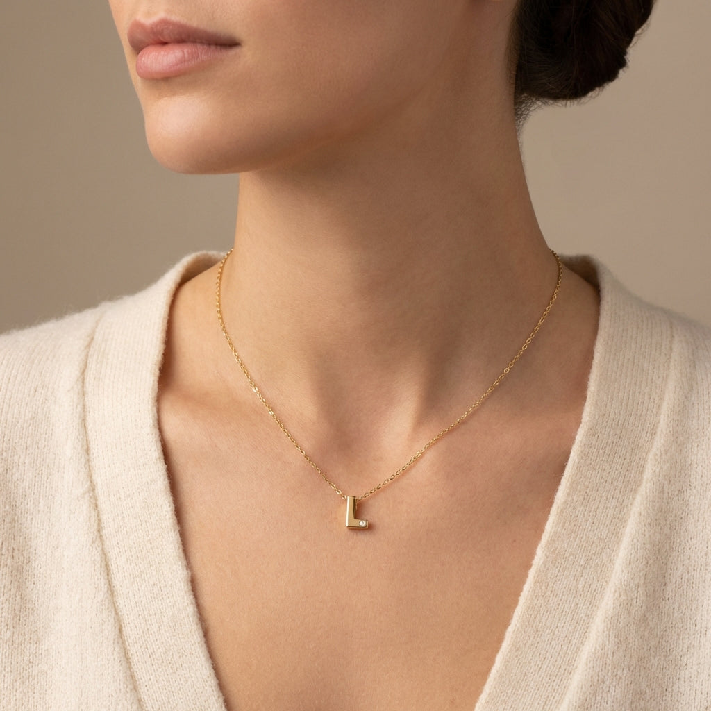 Gold 14Kt initial 'L' necklace with single diamond, delicate chain, personalized jewelry photography by Morelove Designs