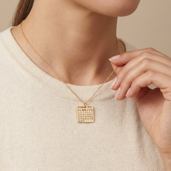 14Kt gold calendar charm with single diamond, personalized date pendant photography by Morelove Designs