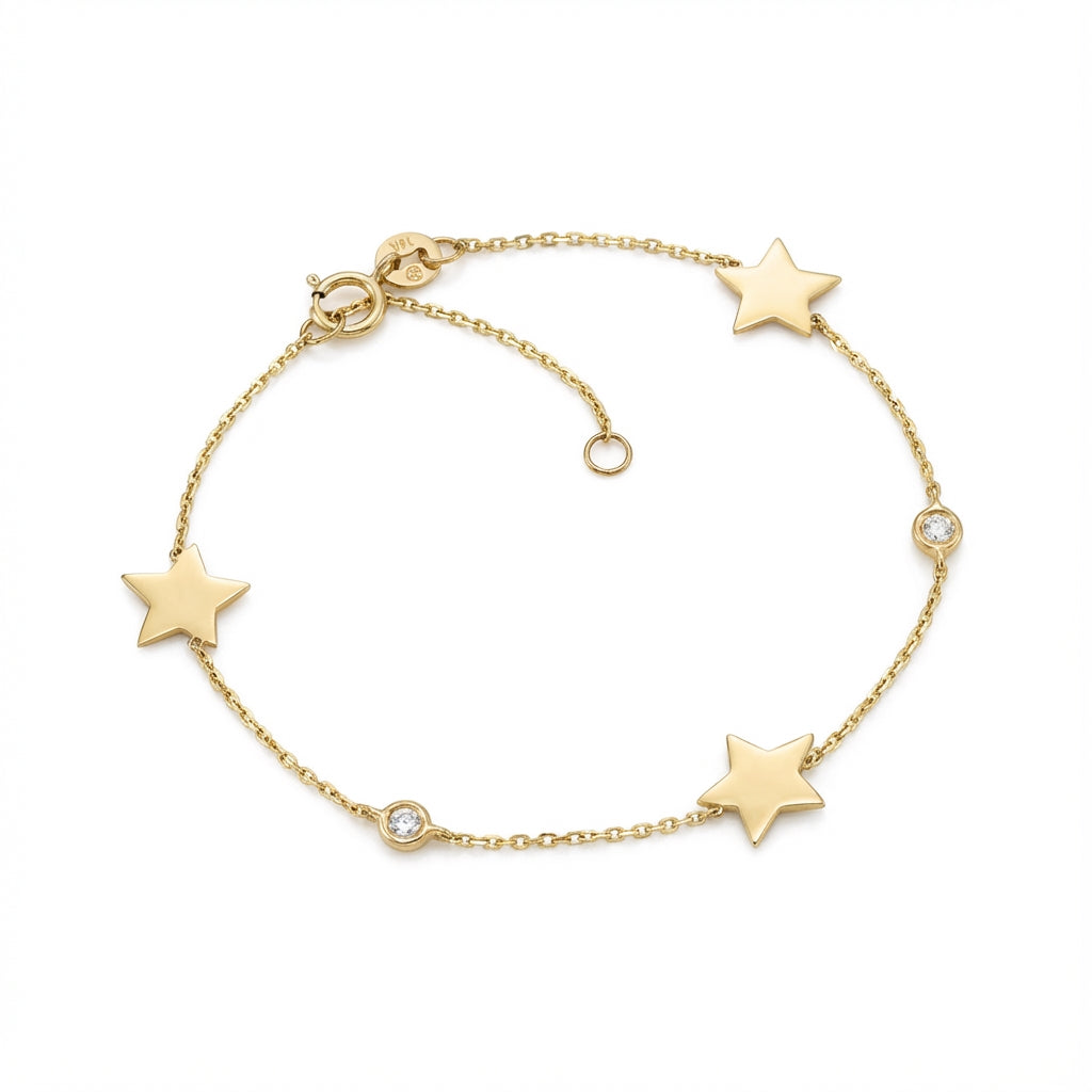 14Kt gold bracelet with three heart charms and two bezel-set diamonds, dainty luxury jewelry for women. product photo by Morelove Designs