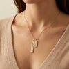 Personalized 14Kt gold vertical bar name necklace with zircon photography by Morelove Designs